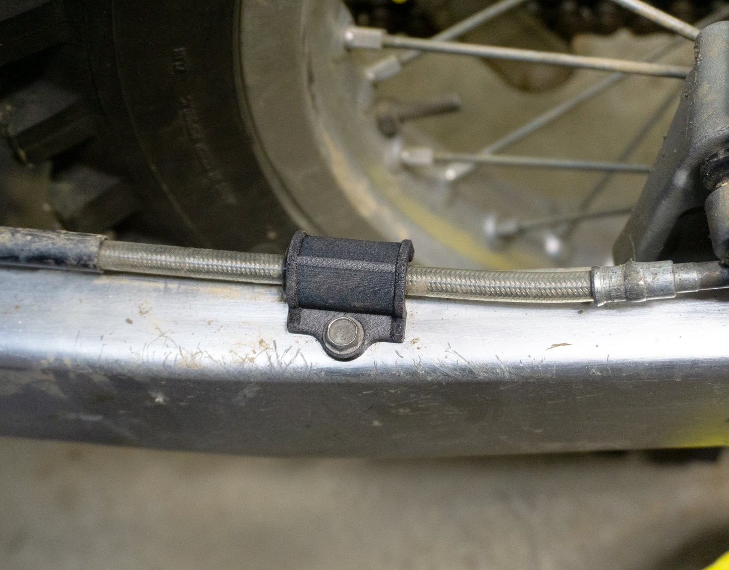 Husqvarna brake line guide clamp